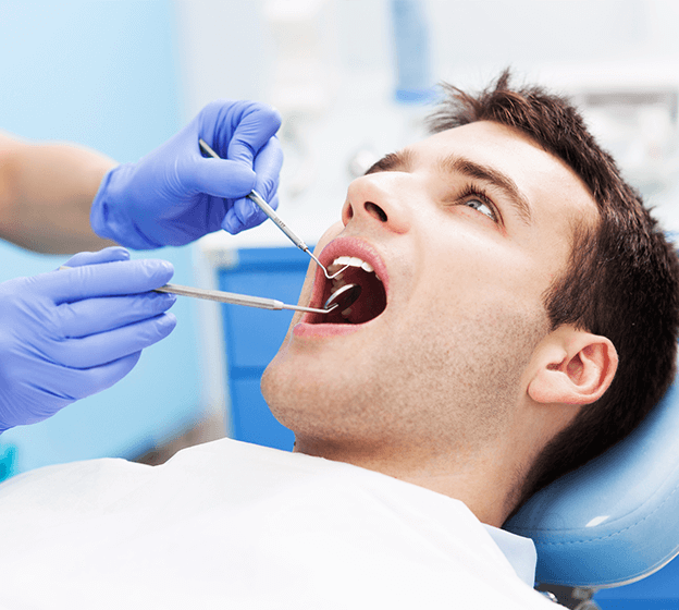 man receiving dental work